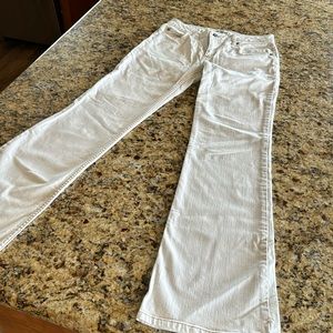 Cabi white flared jeans with cute back pocket detailing. Worn once.